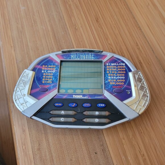 Who Wants To Be A Millionaire Handheld Game by Tiger. Y2k vintage games electron - Picture 1 of 6